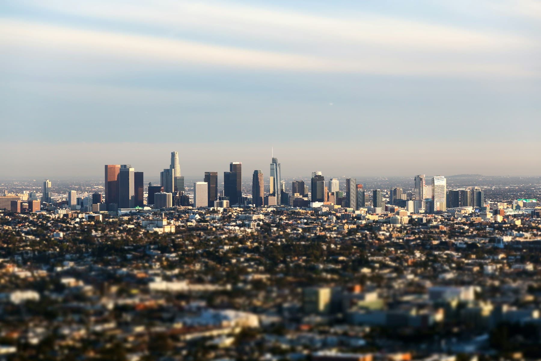 Downtown Los Angeles skyline under a cloudy sky